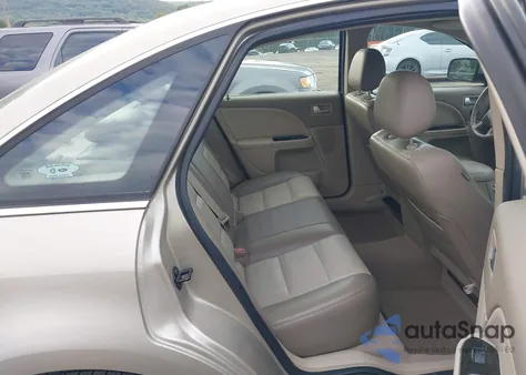 2005 Mercury Montego Premier из США, поврежденный, VIN 1MEHM43135G606165